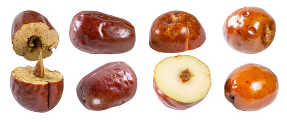 Fresh and dried jujube fruits isolated on white, with two cut in half to show their flesh.