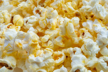 Tasty popcorn close up background top view