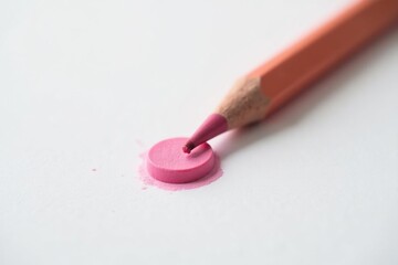Close-up of a pink eraser and a sharpened pencil on white background , school, school supplies, isolated