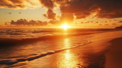 Golden sunset over a tranquil ocean shore.