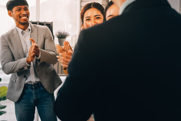 Conference, team of coworkers clapping hands for success and in boardroom of presentation with lens flare. Support, achievement and diverse group of people applauding together in business meeting