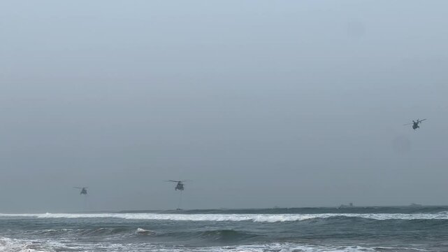 HAL Dhruv Indian navy helicopters practising during Navy day