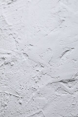White acrylic illustration textured plaster. Drops, lines, arrows, cracks in close-up. Drawing with a spatula