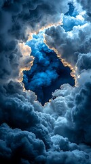 Dramatic Dark Blue Cloudscape at Night with Golden Light