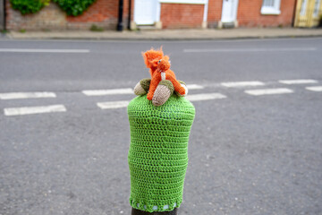 knitted red squirrel with acorn bollard topper in Titchfield Hampshire England