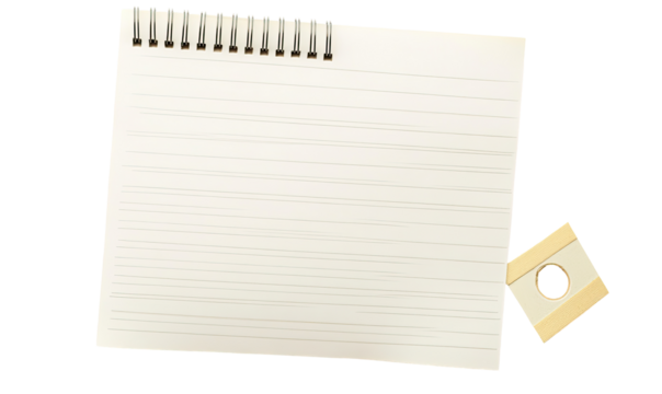 Blank notepad with lined paper and a small sticker