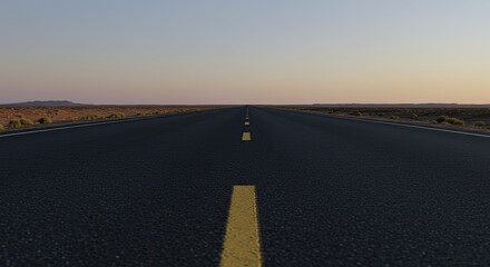 Naklejka premium Empty highway stretches into the horizon at dawn. Vast, open road