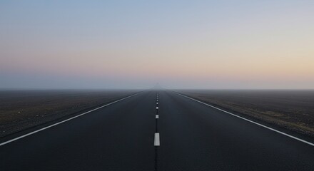 Fototapeta premium Empty road stretching into a hazy morning