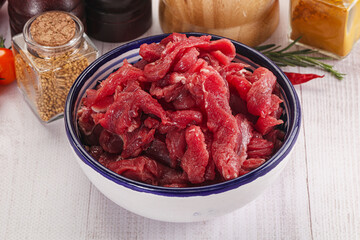 Raw beef meat - sliced strips