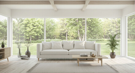 Fototapeta premium Bright living room with a large white sofa and windows. 