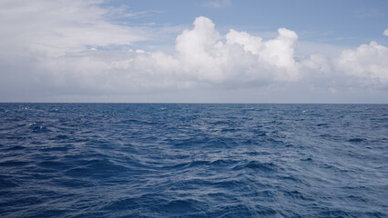 Side view from boat in Indian ocean sailing between Seychelles islands in daytime