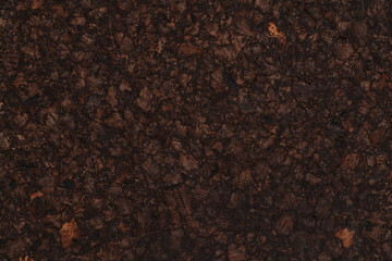 Texture of dark cork with oil finish
