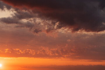 Fototapeta premium Sunset clouds in the sky in summer evening