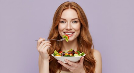 Woman eating salad