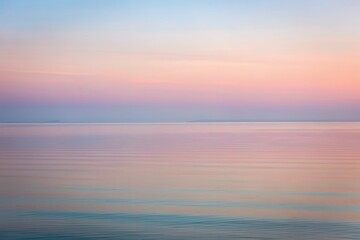 Serene Seascape Pastel Sunset over Calm Ocean Waters