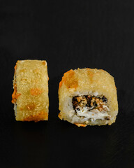 Japanese sushi rolls on a blackboard