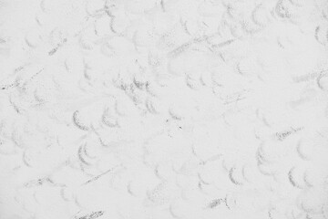 Squash balls at high speed left marks on the side wall of the court