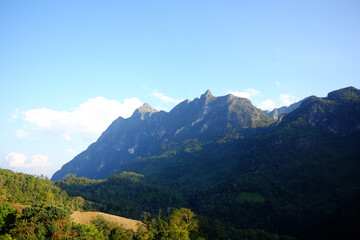 Beautiful landscape of valley Doi Luang Chiangdao mountain with cloud and blue sky, Chiangmai Province of Thailand. Destination travel
