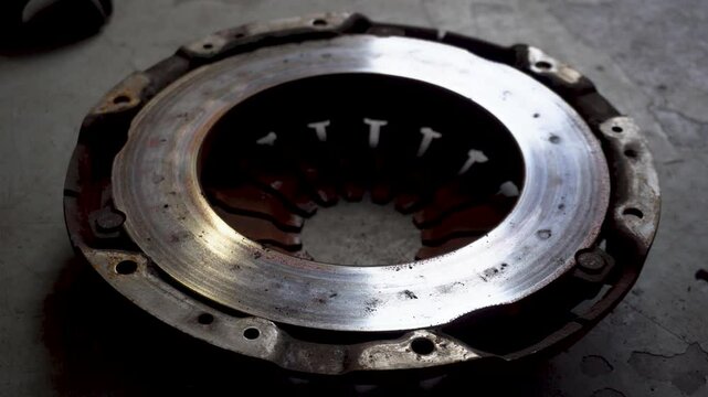 Car service. new and worn car clutch. Car repair concept. Car maintenance