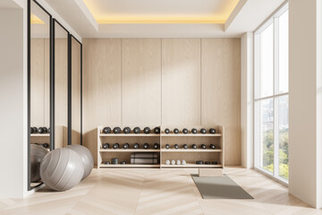 Modern home gym interior with wooden walls, fitness equipment, large windows, bright natural light, minimalist design, mirrors, and yoga mat. 3D Rendering