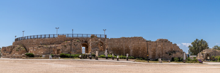 Panoramic view of the reconstructed ancient Roman amphitheater at Caesarea National Park in Israel.
