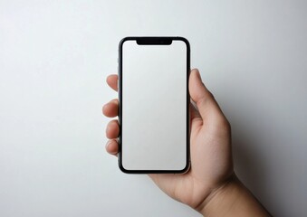 A person's hand holding a smartphone with a blank white screen, showcasing a modern mobile device against a simple white background.  Ideal for app presentations or mobile technology a : Generative AI