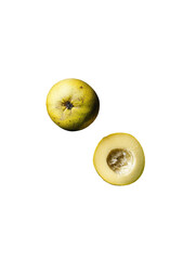 Two halves of a pale yellow fruit