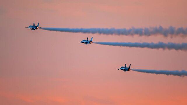 Jet aircraft flyover sunset display