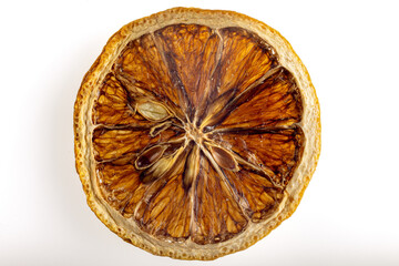 Dried lemon slices under macro lens, white background