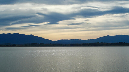 Fototapeta premium Mountain lake in the south of France, Villeneuve de la Rao, atmosphere, vacation, holidays, place to relax, golden hour