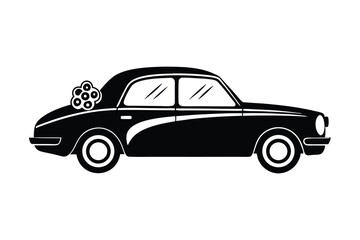 Classic vintage car silhouette showcases decorative floral arrangement at the rear elegantly