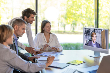 Fototapeta premium Business people meeting conference discussion corporate concept with colleague in video chart, discussing financial report of their company