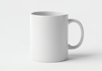 Obraz premium Simple white ceramic mug with handle on a plain white background, perfect for customization