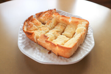toast or bread with butter topping , toast bread or sliced bread