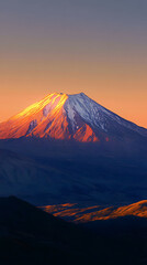 Majestic Sunrise Over Snow-Capped Mountain Peak