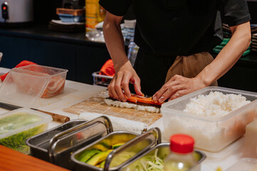 Professional and experienced sushi chef is make sushi.