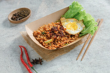 Korean spicy instant noodle and egg in take away box