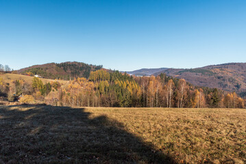 Fototapeta premium Autumn Slezske Beskydy mountains from hiking trail bellow Filipka hill summit in Czech republic