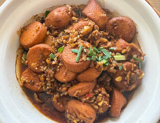 Close up of stir fried seasoned Angsio Tofu with minced chicken and mushrooms. Typical famous and...