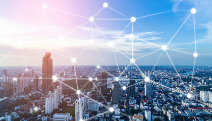 Naklejka premium Urban Skyline with Digital Overlay and Connection Network Design