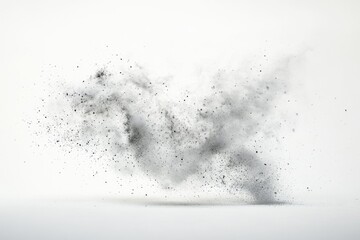 A monochrome photograph captures a dynamic explosion of dark particles against a stark white background, creating a dramatic contrast.