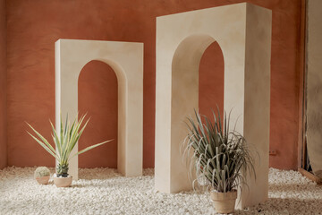 Minimalist Interior with Arches, Plants, and Natural Light