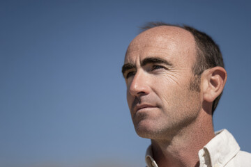 Fototapeta premium portrait of journalist with focused expression located on left side of frame