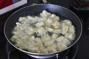Fried tempeh pieces. cooking fried tempeh