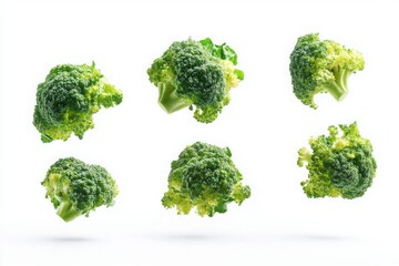 Fresh Green Broccoli Florets Falling Isolated on White Background Healthy Food Concept