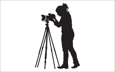 silhouette of photographer with camera