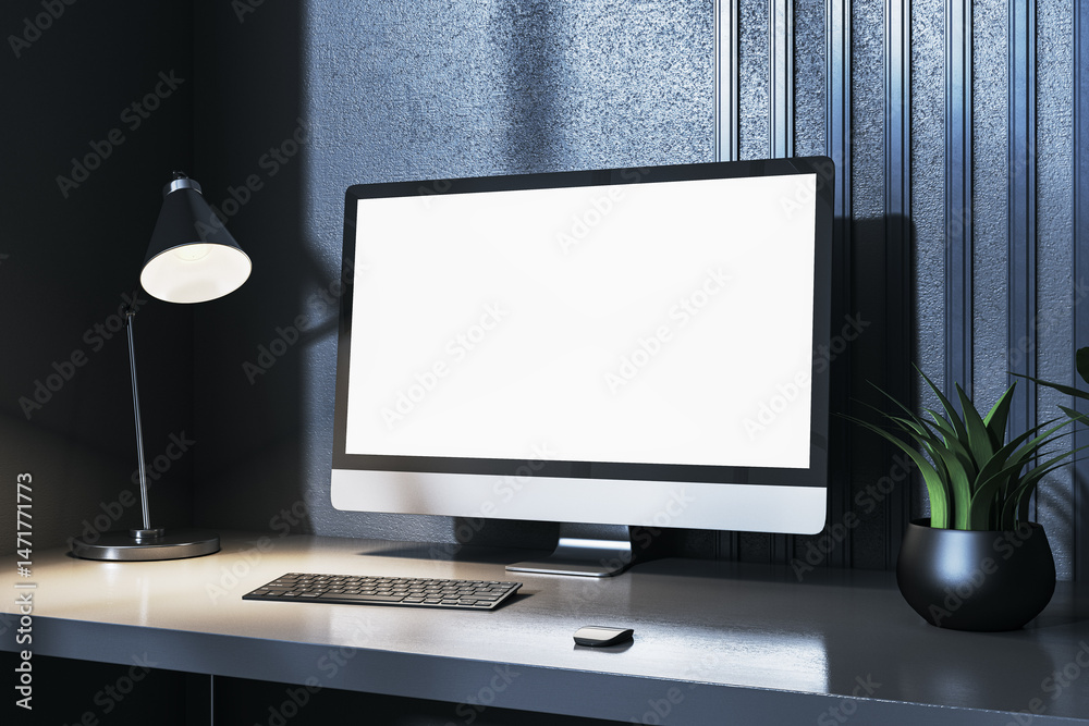 Poster blank desktop computer screen mockup on modern dark office desk with lamp, keyboard, and plant for w