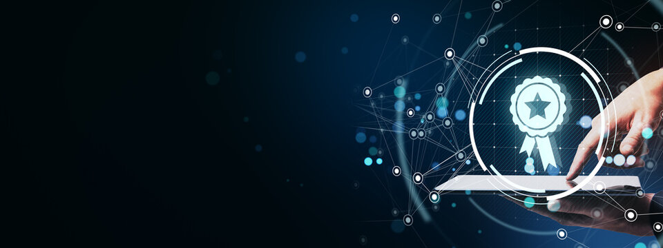 Business person touching tablet with digital award badge icon on futuristic tech background symbolizing innovation and quality assurance concept.