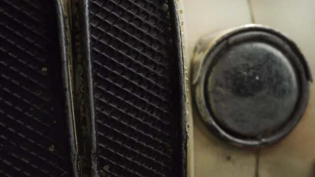 Vintage car front end rotating extreme close up stock footage