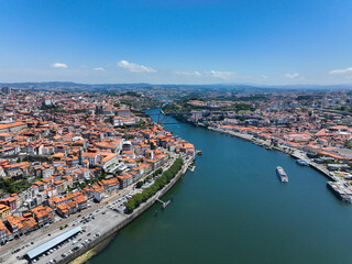 Obraz premium Wide aerial view of Porto and Gaia flanking the Douro River